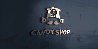 Candy Shop With A Bear Holding A Candy Logo